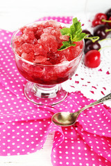 Closeup of cherry granita in glass bowl,