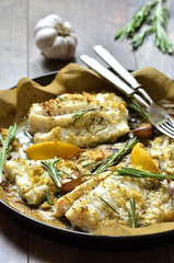 Baked cod with ginger,lemon and rosemary.