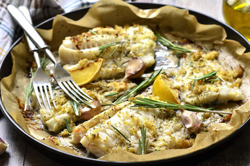 Baked cod with ginger,lemon and rosemary.