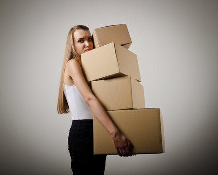 Woman and cardboards.