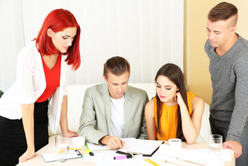 Group of people having meeting in office