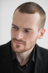 Fototapeta premium Portrait of a businessman looking away