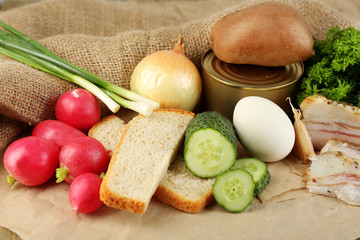 Bacon, fresh vegetables, boiled egg and bread