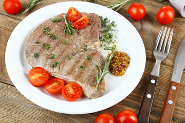 Delicious grilled meat on table