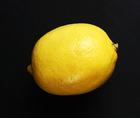 Lemon on black background