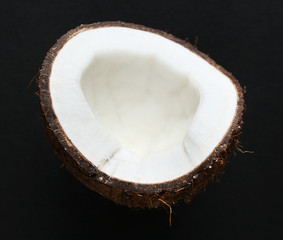 Coconut on black background