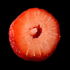 Strawberry slice on black background