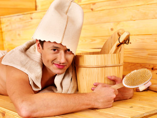 Group people in hat  at sauna.