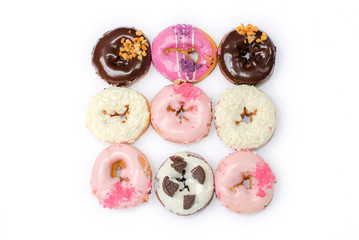 Sweet Colorful delicious donuts on white background