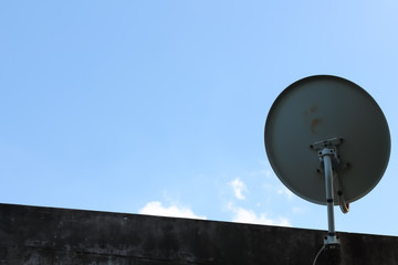 Satellite dish with blue sky