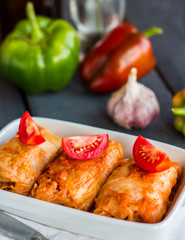 stewed stuffed cabbage with meat and tomatoes, Russian cuisine