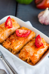 stewed stuffed cabbage with meat and tomatoes, Russian cuisine