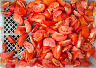 heap of sliced red tomatoes freshness