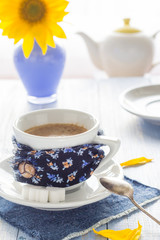 coffee cup black wooden board brown white jug milk sunflower