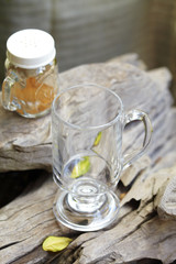 close up empty glass on wooden table in restaurant