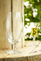 close up empty glass on wooden table in restaurant