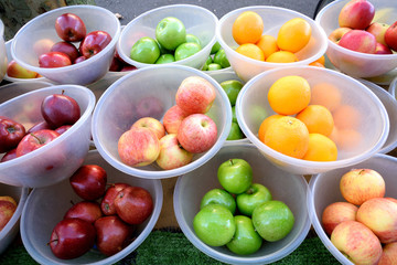 Fruit in bowls on market
