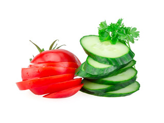 Cucumber and Tomato slices isolated on white