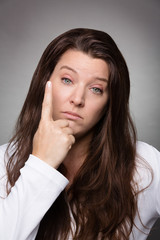 woman faces dark - brooding