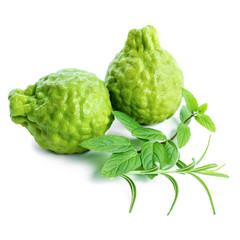 kaffir Lime or Bergamot fruit and green grasses is isolated on w