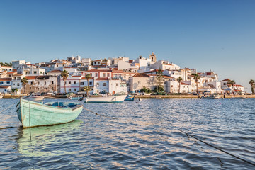 Old sea town of Ferragudo. With the boat in the foreground. - obrazy, fototapety, plakaty