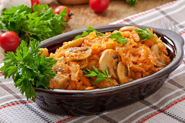 Stewed cabbage with mushrooms and tomato sauce