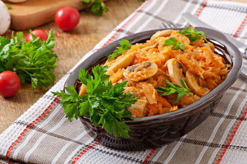 Stewed cabbage with mushrooms and tomato sauce