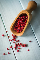 scoop with burning hot pepper seeds