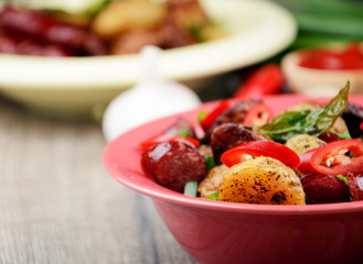 New roasted baked potatoe in the bowl
