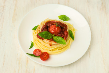 pasta with tomato sauce and basil