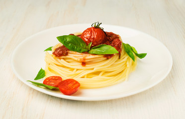 pasta with tomato sauce and basil