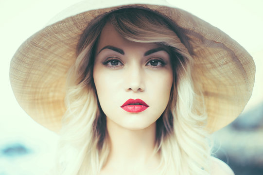 Lady In Straw Hat