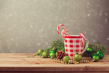 Christmas holiday decorations with checked cup and candy