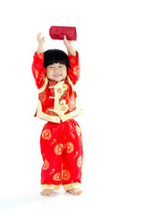 Cheerful asian boy holding a red packet