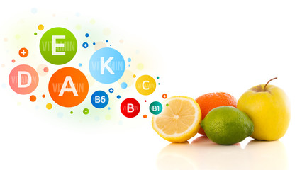 Healthy fruits with colorful vitamin symbols and icons