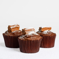 Three Chocolate Cupcakes