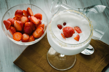 Cream and strawberries