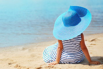 Summer, vacation, travel and people concept - pretty little girl