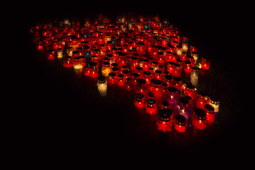 Many lighted candles