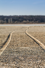 The road along the bottom of the dried lake, shallower depth of