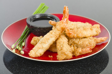Ebi Tempura - Prawn tempura served with soy sauce.