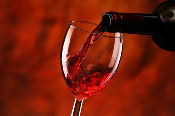Pouring red wine - 72513953