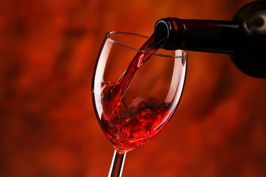 Pouring red wine