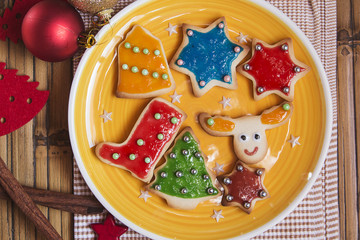 Christmas handmade cookies on wooden background