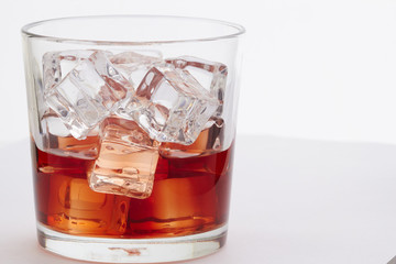 Whiskey with ice cubes