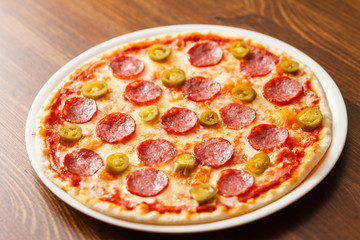 pizza on wood background