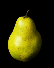 Pear on black background