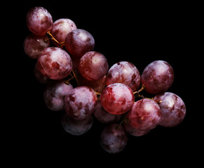 Grape on black background