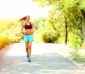 Young woman jogging at park