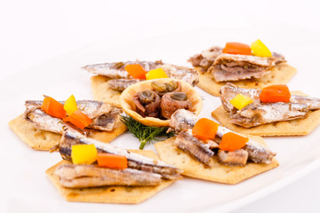 Fish on crackers